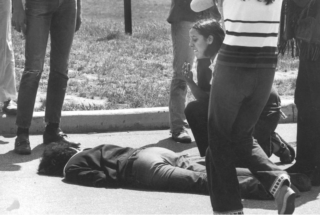 Kent State University National guardsmen shot and killed four student bystanders during anti-war demonstrations on the