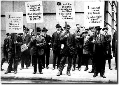 Document 18 A group of poor men hold signs given to them by eugenics supporters on Wall Street, New