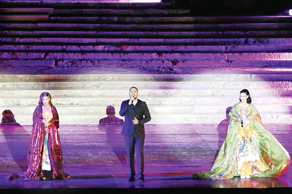NEWS/FEATURES 21 Left to right: Lebanese singers Aline Lahoud, Ramy Ayach and Brigitte Yaghi perform during the opening of the Baalbek international festival in Lebanon s eastern Bekaa Valley on July