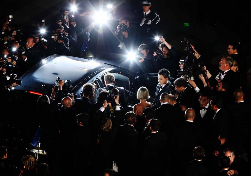 Photographers surround Johnny Hallyday s car during the 62nd International
