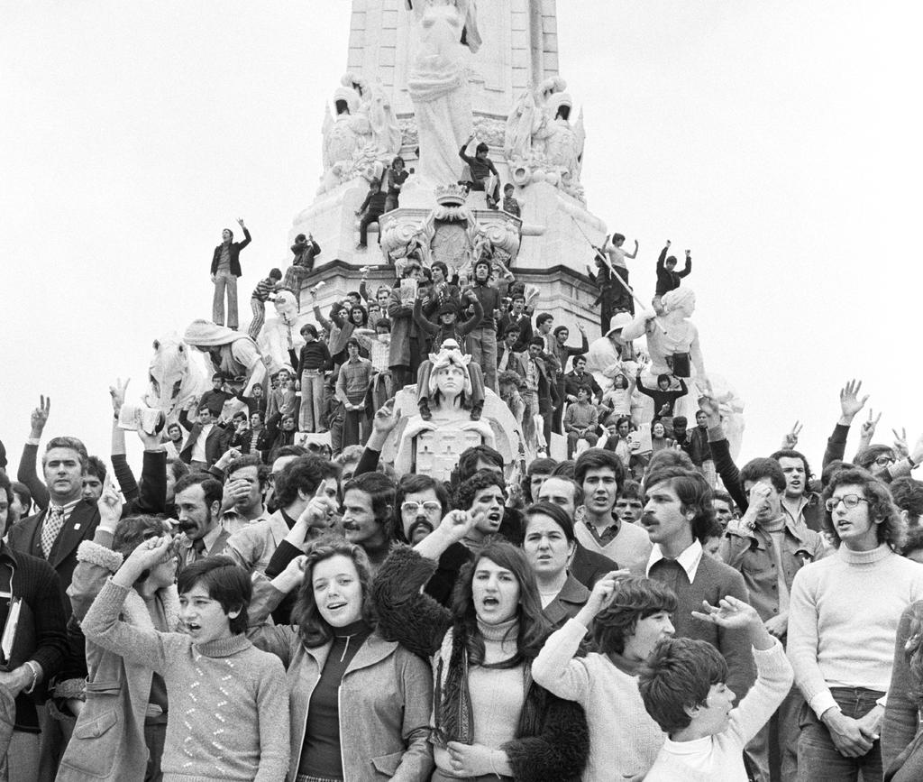Lisboans celebrate the end of a half century of dictatorship in 1974.