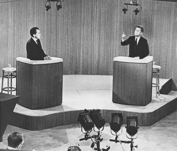80 THE HISTORY OF THE DEMOCRATIC PARTY Richard Nixon (left) and John F. Kennedy are shown in a photograph from one of the 1960 presidential campaign debates.