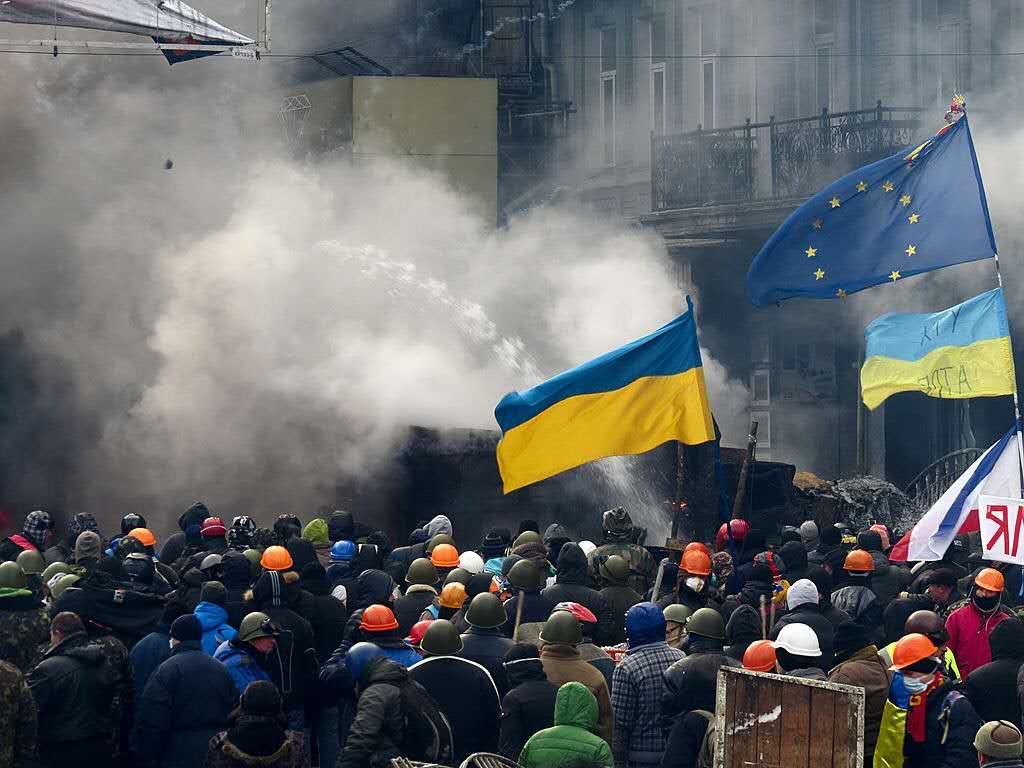 This decision resulted in mass protests by its proponents, known as the Euromaidan".