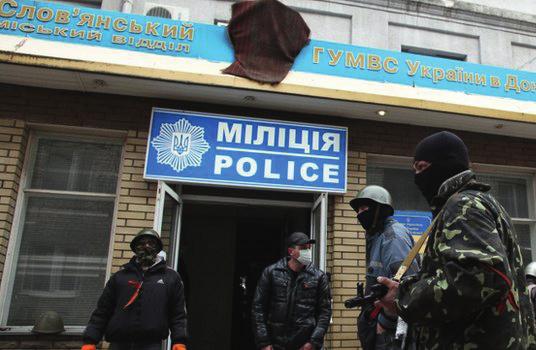A police station in Sloviansk was taken over on April 14, 2014 by unidentified gunmen. (Photo: AFP) C.
