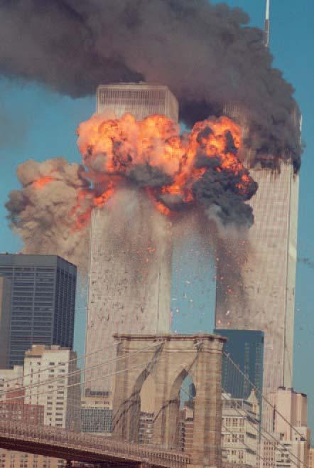 In a coordinated effort, two hijacked commercial jets struck the twin towers of the World Trade Center in New York City, one crashing just minutes after the other.