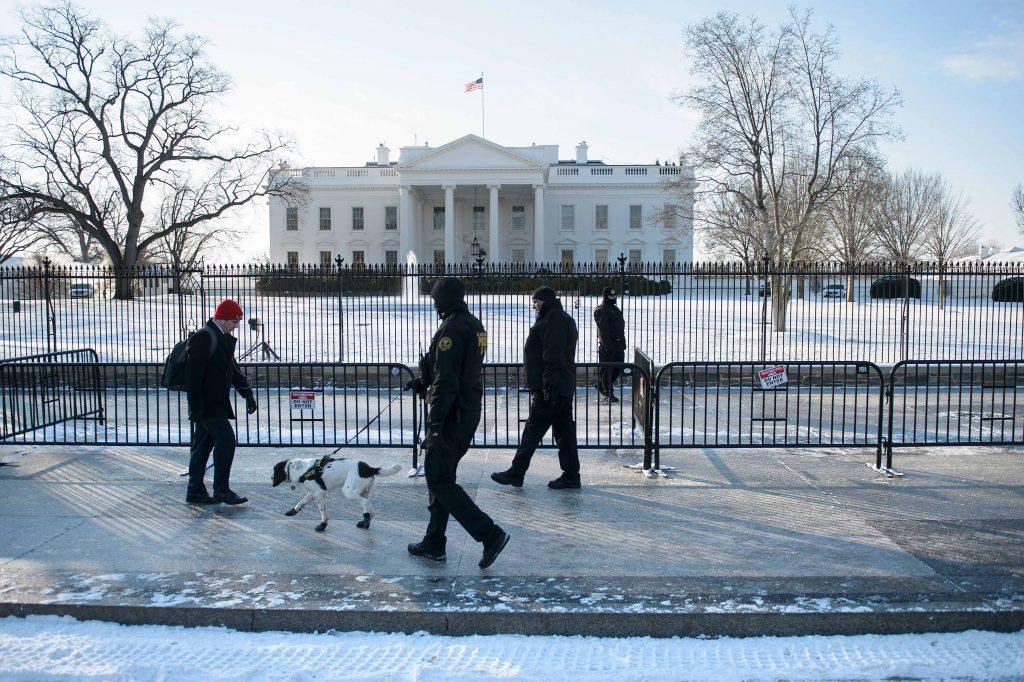 A man walks along Pennsylvania Avenue past the White House and Secret Service officers in Washington, D.C. BRENDAN SMIALOWSKI/AFP/Getty Images Leaders experience government as chaos.