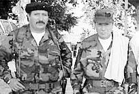 alias Manuel Marulanda or Tirofijo ( Sureshot ), the group s paramount leader; and Jorge Briceño, alias El Mono Jojoy, its chief military strategist.