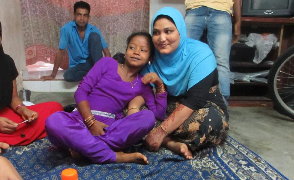 This Rohingya mother and daughter arrived in Malaysia after spending weeks on a boat and then in a Thai camp. They live with other Rohingya families in a small house in Kedah.