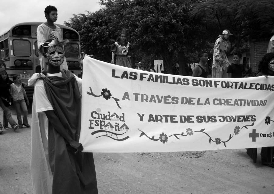 Child clients of Arte Acción, a non-profit that gives Honduran youth alternatives to violence and poverty through art training and internships, parade on the outskirts of Tegucigalpa.