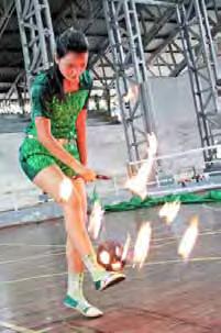 of men. More recently, women are adapting the sport to suit their style and even compete professionally. Ma Thidar Oo plays with fire.