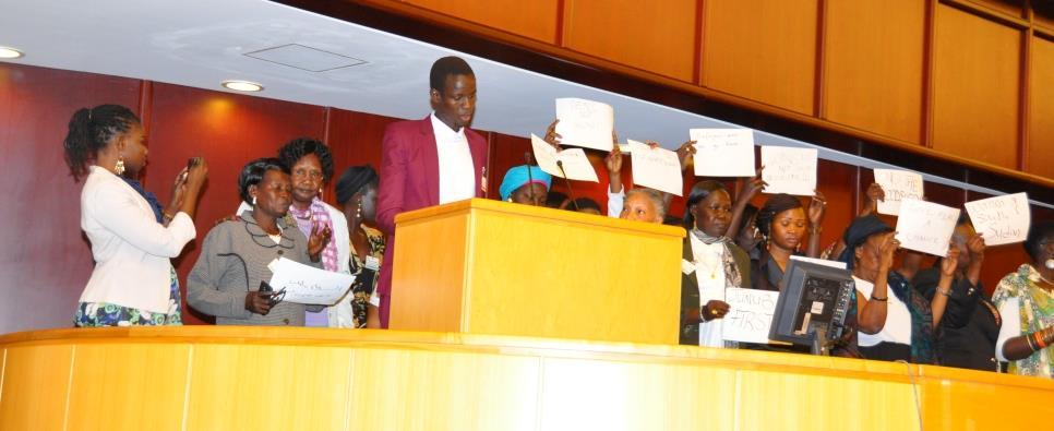 South Sudan Situation Stakeholders from South Sudan hold up signboards containing peace messages.
