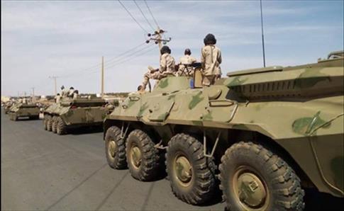 Figure II RSF troops driving a column of armoured personnel carriers (possibly Shareef 1) into Darfur 80. The Shareef 1 armoured personnel carrier is the Sudanese variant of the BTR 70 and BTR 80.