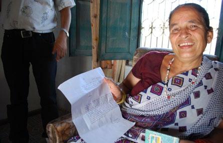 Maya Sharma, a land rights activist, visits a Land Revenue Office in Rupandehi District with the documents she brought in that demand formal recognition for her claim to land she has been living on.
