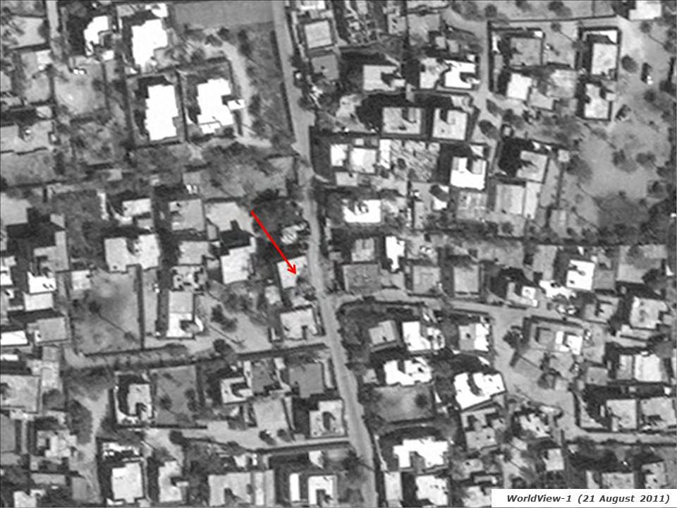Figure 19. Tripoli building on 21 August 2011 The location in question (see red arrow) on 21 August 2011.