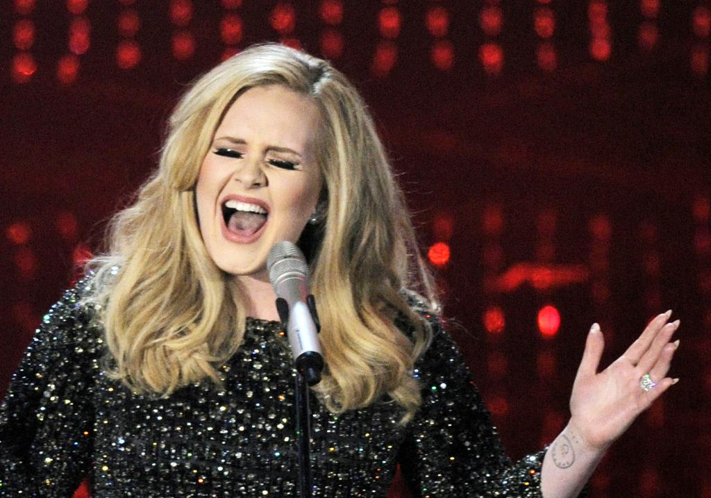 www.mmtimes.com the pulse 45 ngs: Homage or marketing ploy? Singer Adele performs Skyfall during the Oscars at the Dolby Theatre in Los Angeles on February 24.