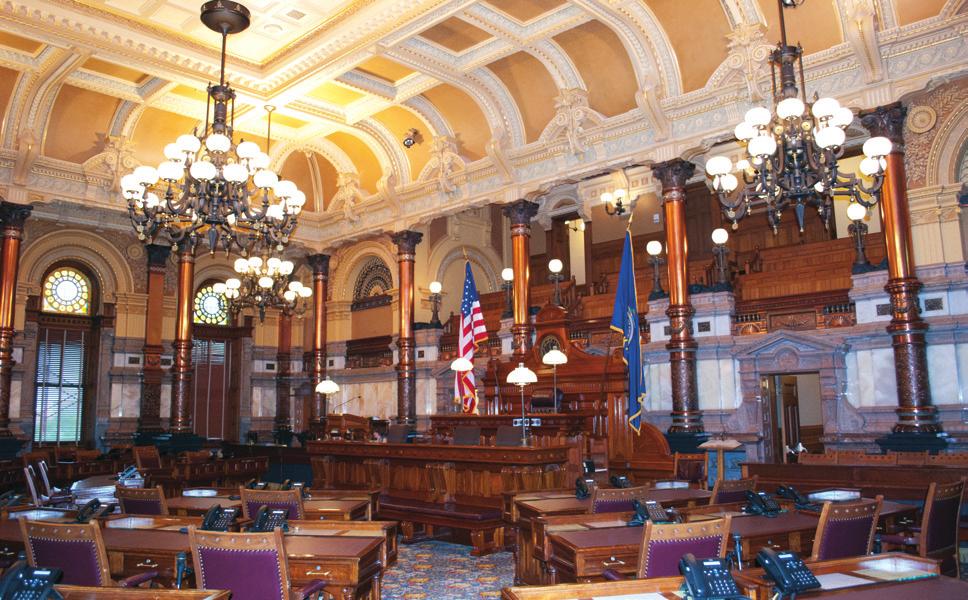 Senate The Senate chamber features several types of marble, the original native Kansas wild cherry wood desks, and