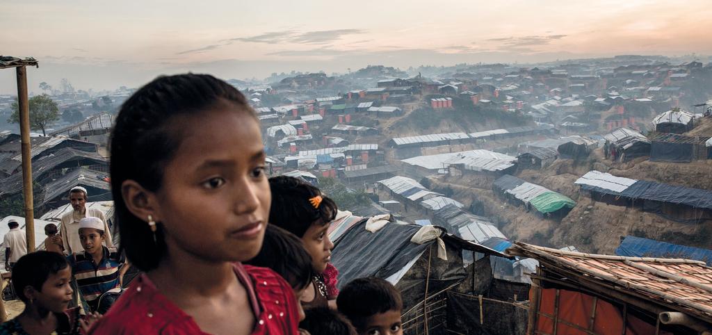 OVERVIEW SPECIAL ENVOY OVERVIEW SPECIAL ENVOY Expanding partnerships UNHCR/ Andrew McConnell Young Rohingya refugees look out over Palong Khali refugee camp, a sprawling site located on a hilly area