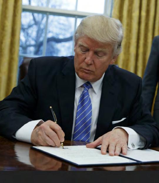 Trump s early executive orders take aim at campaign promises ü Build the wall, secure the border ü Temporarily ban refugees/other immigrants from entering the U.S.