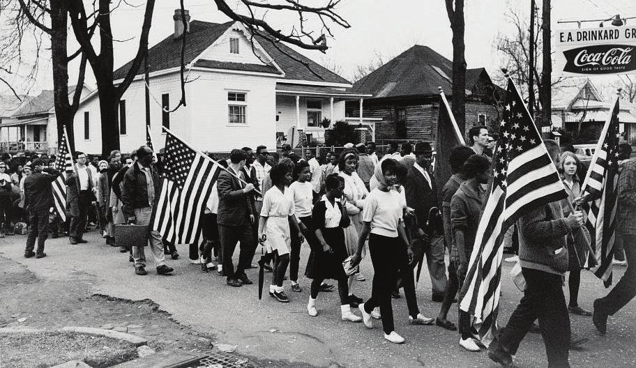 Marchers walk toward the Edmund Pettus Bridge during the Selma to Montgomery March for Voting Rights of 1965.