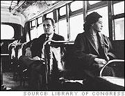 Rosa Parks refused to give up her seat at the front of the "colored section" of a bus, defying a southern custom of the time.