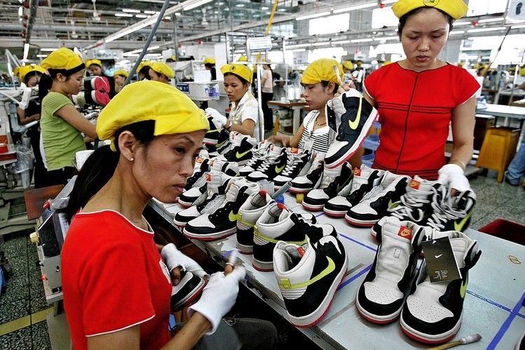 What is productivity, division of labor and specialization theory? How do these systems generate wealth? Workers assemble shoes in Vietnam in 2005. Source: http://www.wsj.