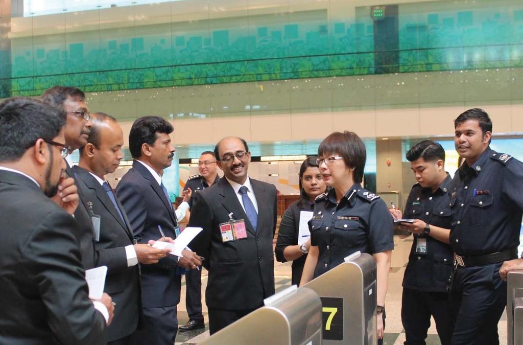 Officials of the Sri Lankan Department of Immigration and Emigration inspecting passenger processing facilities at Singapore Changi Airport.