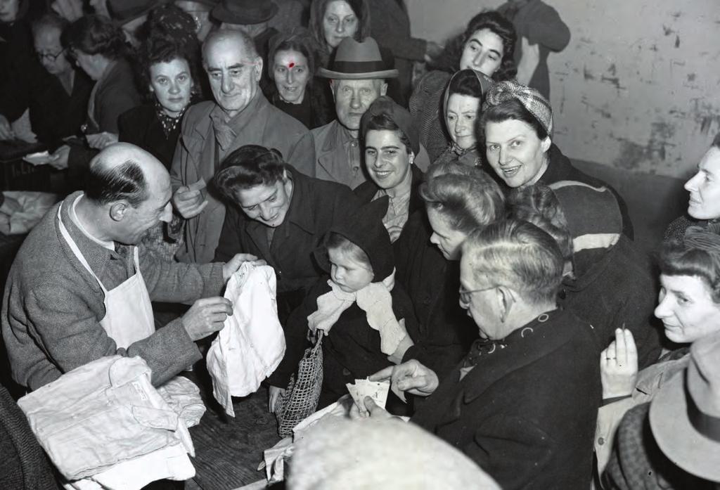 Shanghai refugees receiving clothing The story of Laura Margolis reads like an epic novel.