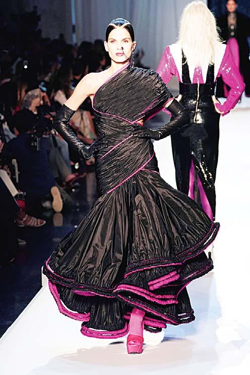 The long, floor-sweeping organza gowns that evoke the Renaissance Valentino Above and below: Models display creations by Valentino, Jean Paul Gaultier, Fendi, Viktor and Rolph and Zuhair Murad during