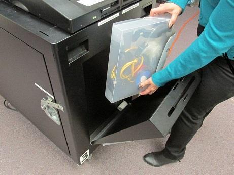 MACHINE OPENING Remove the seal from the Ballot Box door, record the