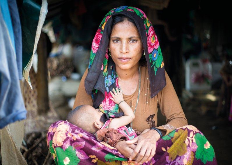 Bangladesh. Lal Moti (35) and her daughter, Osmaitara (3 months), in Kutupalong refugee camp in Bangladesh.
