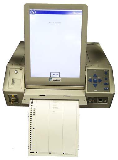 22 Page VI. AUTOMARK OPERATION 1. Insert the blank ballot into the ballot acceptor in the front of the Automark. 2.