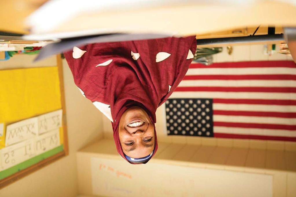 North America and the Photo by J. Rae United States. A Somali refugee learns English at a resettlement centre in South Dakota.