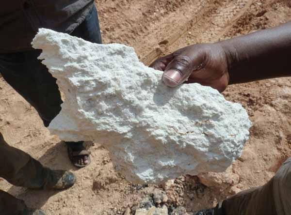 30 MAY 2012 COMING CLEAN Piece of Rwandan manganese containing coltan. In 2010 mining employed around 35,000 people in Rwanda and mineral exports brought in US$68 million.