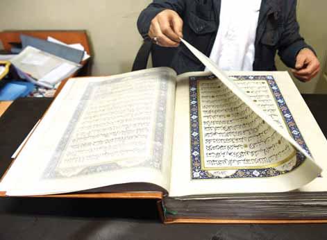 Bound in goat leather and weighing 8.6 kilograms (19 pounds), the Quran was produced by Afghan artisans, many of them trained at British foundation Turquoise Mountain in Kabul.