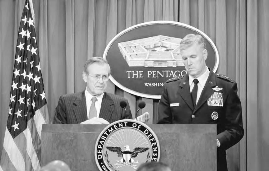 192 OPERATION ENDURING FREEDOM U.S. Defense Secretary Donald Rumsfeld (left) and Joint Chiefs of Staff chairman Gen. Richard B. Myers (right) brief the press on the war with Iraq on 28 March 2003.