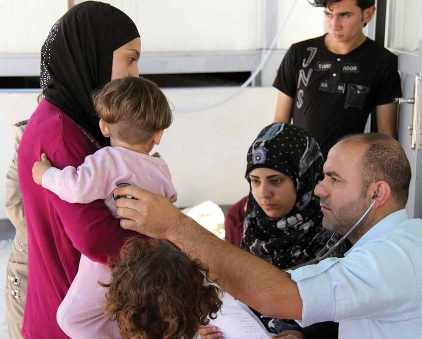 Beneficiaries receive health care from an IOM support facility in South Lebanon.