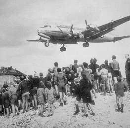 The Candy Bomber American pilot, Gail Halvorsen decides to drop candy with homemade parachutes to children of West Berlin.