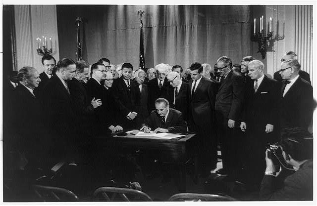 President Johnson signs