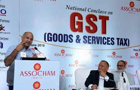 Delhi Deputy Chief Minister Manish Sisodia addresses at ASSOCHAM National Conclave on GST in New Delhi. cellation cases among others continue to make GST a challenge for the sector".
