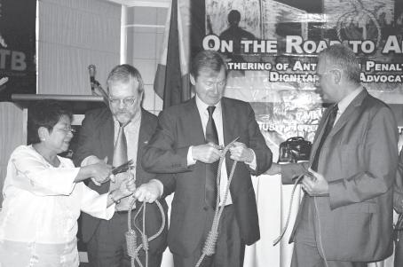 Cutting the ties that kill: Akbayan party-list representative Etta Rosales is joined by top diplomats of the European Union (above); Congressman Edcel Lagman and Sr.