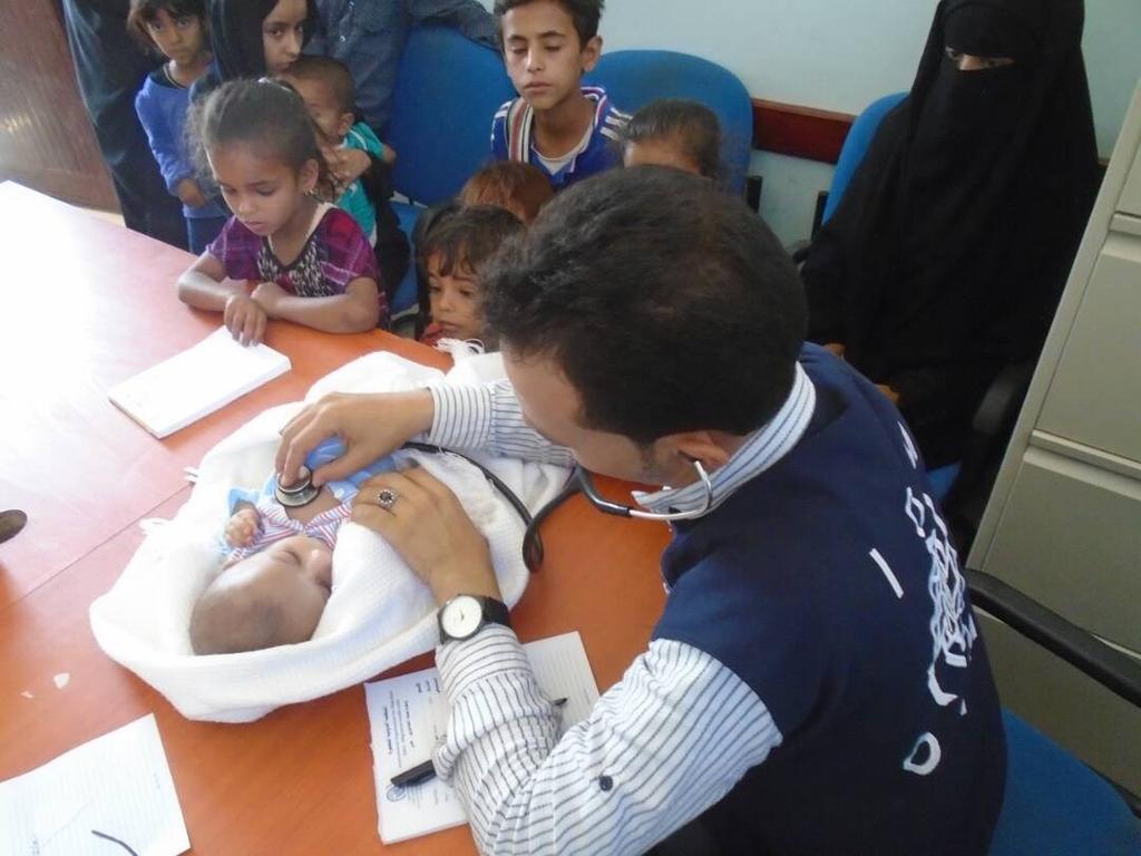 Regular Programming Health Medical examination of an infant in Al-Musayna'h district in Shabwa Governorate.