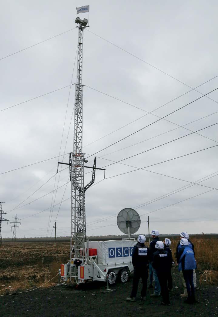 OSCE SMM monitors observe a camera site near Marinka entry-exit