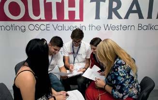 Young people from various Western Balkan countries engage in a lively discussion during a Youth Trail event organized by the OSCE Presence in Albania to mark its 20th anniversary, Tirana, 15