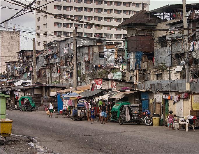 The challenge of modern slums UN-Habitat definitions General a heavily populated urban area characterised by substandard