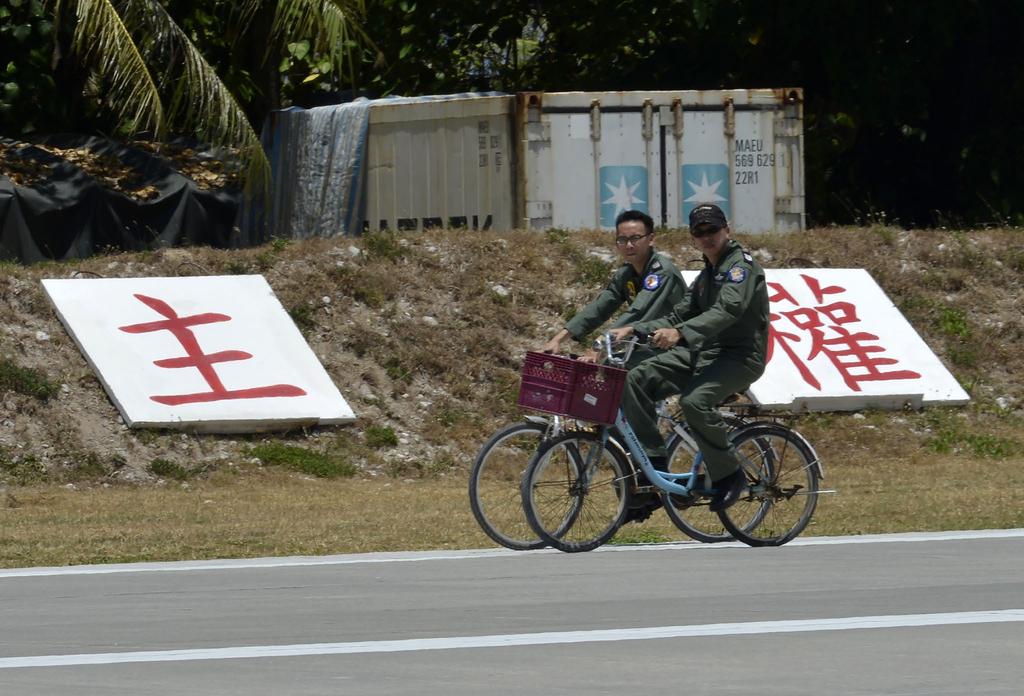 (SAM YEH/AFP/Getty Images) TAIWAN S CHANGING STRATEGY When China s defeated Nationalists fled to Taiwan in 1949, they brought with them territorial claims to all of China, including a then
