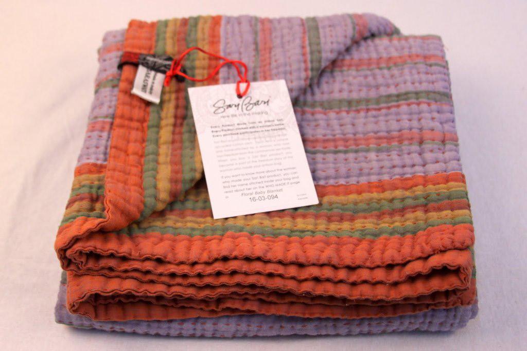 Gifts for Kids Striped Baby Blanket $55 Colorfully striped and unique in every way, this striped baby blanket feature a