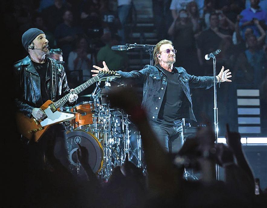 14 SOCIAL U2 top-paid musicians in US last year: survey Rock band U2 guitarist The Edge and frontman Bono are shown here performing at a concert in Nashville in May 2018 were the top-paid musicians