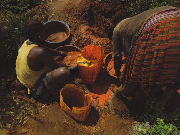 Women mining for gold in Rupa, Moroto.