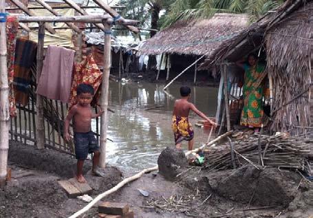 Flood affected area in the northern part of Bangladesh (at the left). These children easily become vulnerable to trafficking.