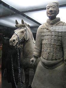 II. Qin Dynasty (221 207 BCE) A. Emperor Qin Shi Huangdi *. 2 Most famous structures built under his command 1. Imperial Tomb with 7000 clay warriors 2.